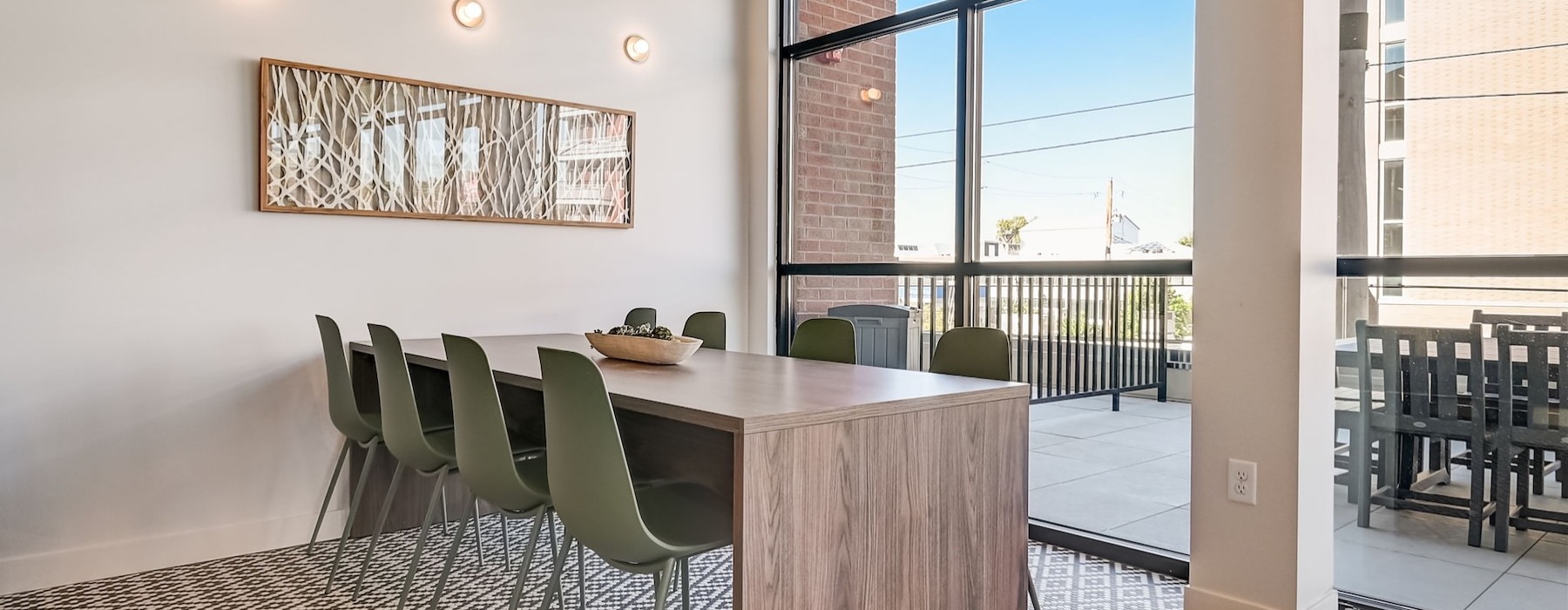 a room with a table and chairs