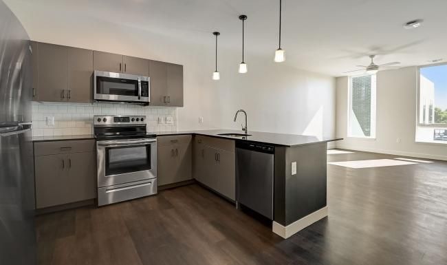 a kitchen with stainless steel appliances