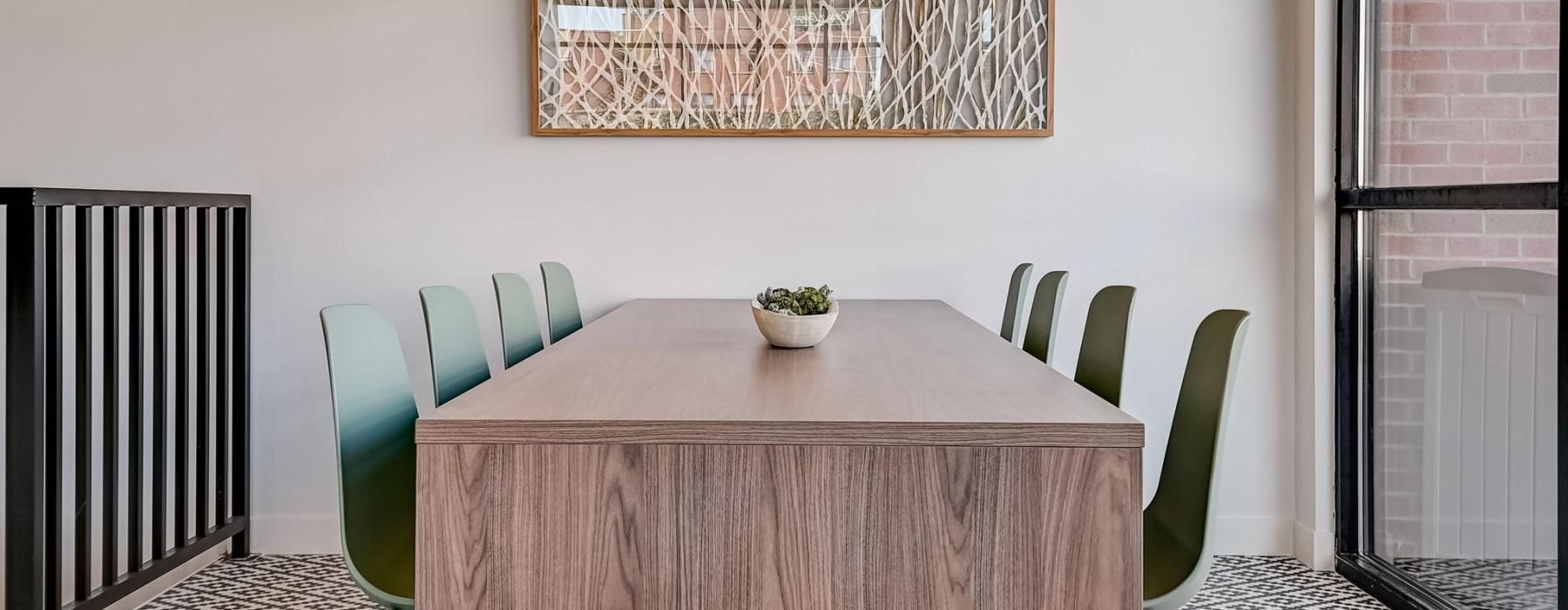 a dining table with chairs around it
