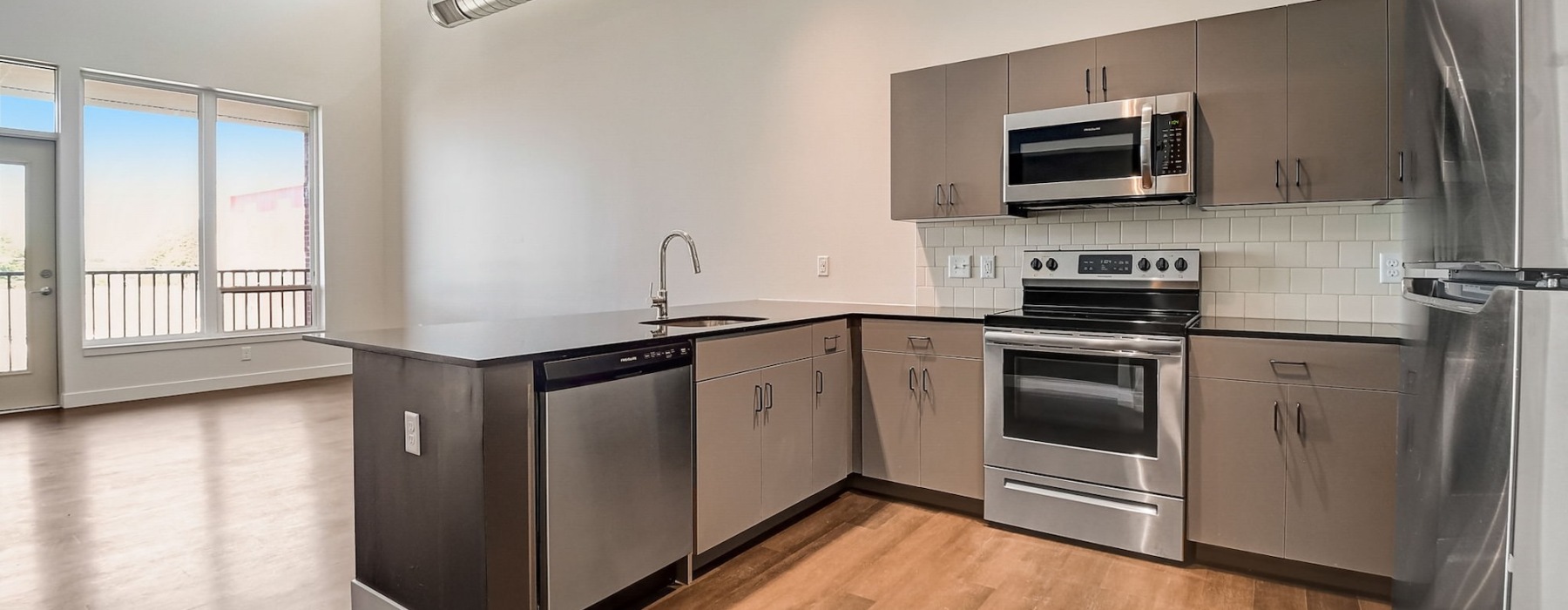 Well-lit kitchen with ample counter space