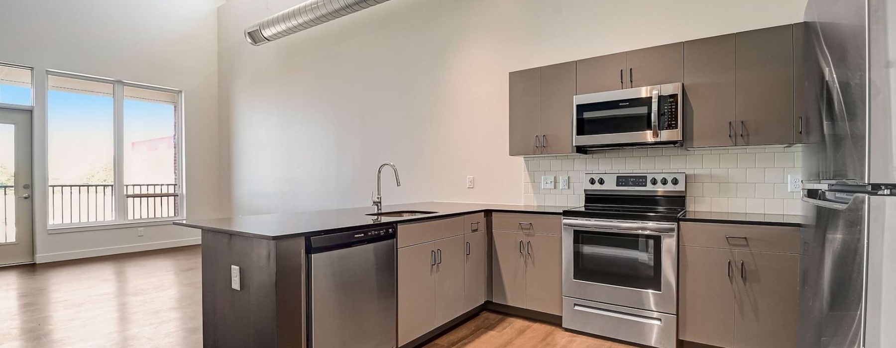 Well-lit kitchen with ample counter space